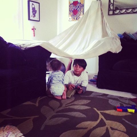Impromptu Playhouse With an Old Sheet